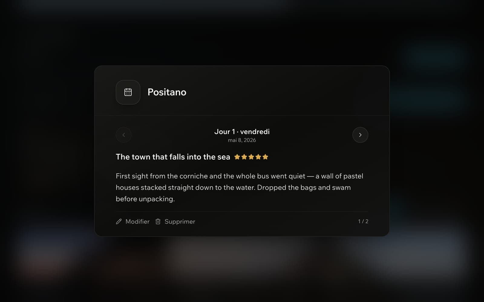 Une journée du carnet ouverte en vue quotidienne par-dessus la page du voyage : Positano, jour 1, une note de cinq étoiles, le titre de l'entrée et son texte.
